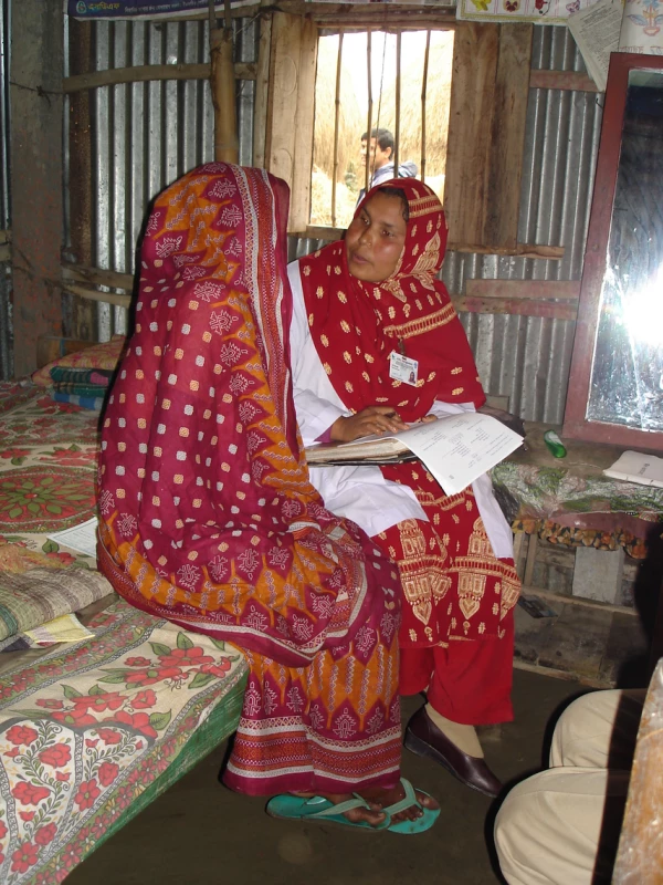 Field interviewer Lipi Begum, of the JiVitA Project in rural Gaibandha, Bangladesh, conducts an enrollment interview with a consented study participant.